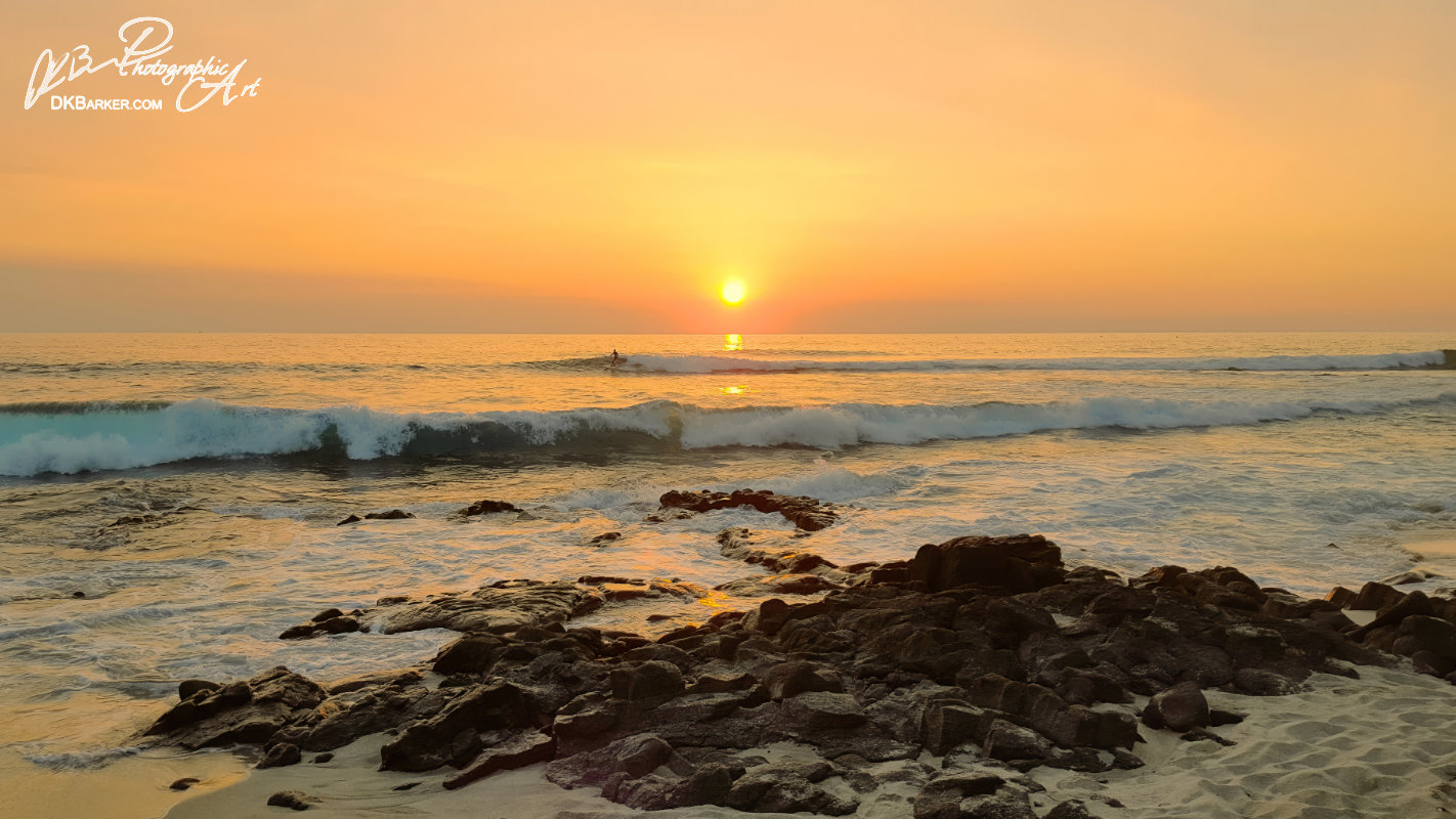 Kona Sunset, Rocks and a Surfer Print
